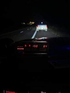 Dashboard display showing 150 km/h and 84