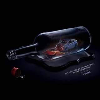 Car inside a bottle. It’s time everyone got the message. Impaired driving kills.