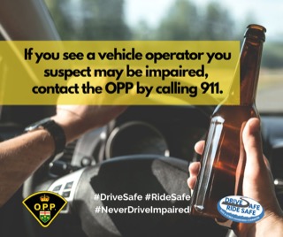 A hand holding a beer bottle behind a steering wheel. Text reads, &quot;If you see a vehicle operator you suspect may be impaired, contact the OPP by calling 911.&quot; Hashtags: #DriveSafe #RideSafe #NeverDriveImpaired. OPP logo and a drive safe awareness committee logo are visible.