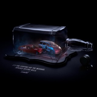 Two crashed cars inside a bottle. It’s time everyone got the message. Impaired driving kills.