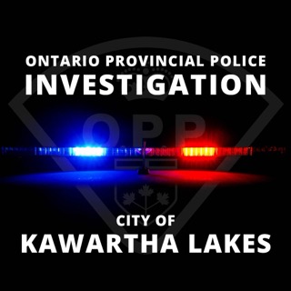 OPP crest with flashing red and blue lights