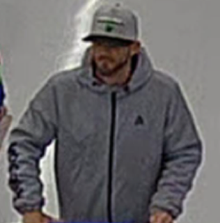 Man in a gray hoodie