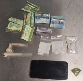 Canadian currency and small plastic bags.
