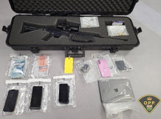 Firearm in a case, various baggies