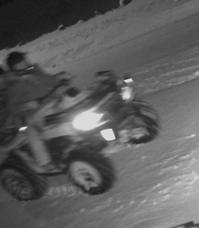 Blurred image of a vehicle moving quickly.