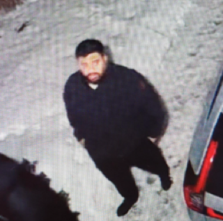 Man in black sweater and pants