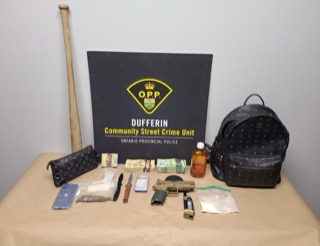 OPP logo, Dufferin Community Street Crime Unit, Ontario Provincial Police Baseball bat, black backpack, cash, pills, handgun, plastic bottle, wallet, baggies