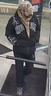 Person in black jacket and pants