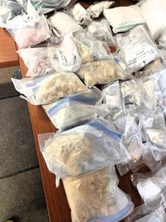 Packages of cut meat on a table.