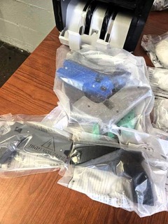 Parts in plastic bags.