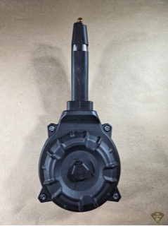 Black ammunition drum.
