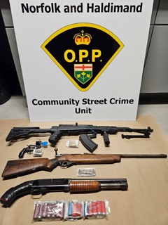 Ontario Provincial Police logo and Community Street Crime Unit text. Several firearms and ammunition.