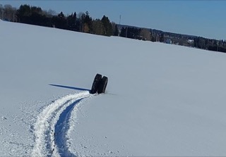 Tire tracks in snow.