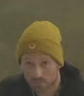 Person wearing a yellow beanie
