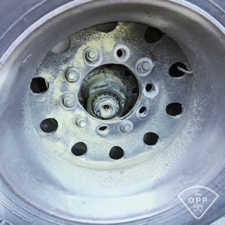 Tire and wheel with visible lug nuts