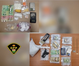 Drugs, cash, and a handgun on a surface