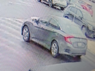 Gray sedan, side view