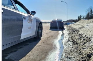OPP cruiser, snow and ice on road