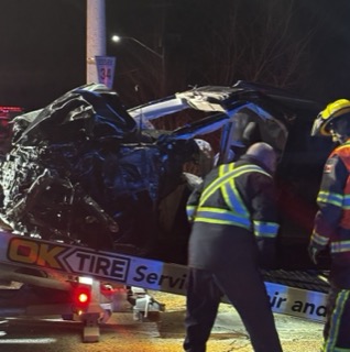 Damaged vehicle, emergency responders