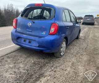 Blue hatchback car, rear view