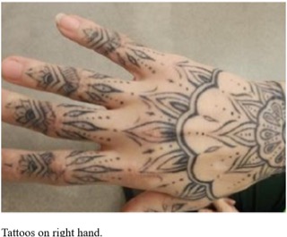 Detailed blackwork tattoos.