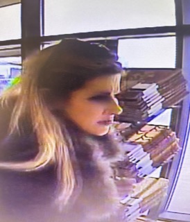 Person with long hair looking off to the side
