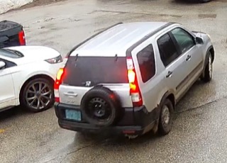 Silver Honda CRV, rear view