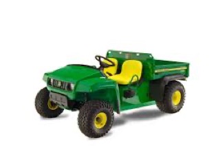 Green utility vehicle with yellow seats and tires