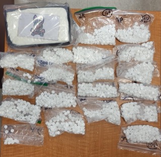 Small white plastic beads filling clear plastic bags.