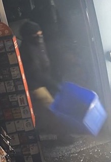 Blue plastic bin, dark space, red box