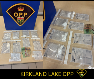 Sealed bags of suspected drugs and Canadian currency.