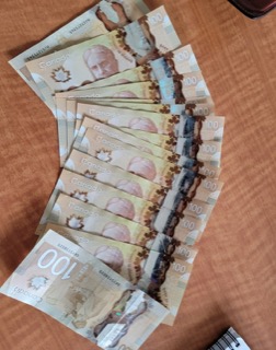 Several Canadian twenty-dollar bills.