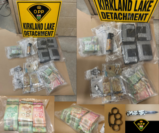 Canadian currency and handcuffs on a gray surface.