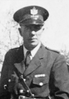 Man in military uniform, facing forward