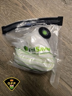 Green and white vacuum seal bag