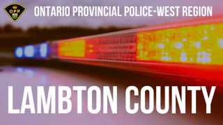 Ontario Provincial Police logo, flashing red and blue lights
