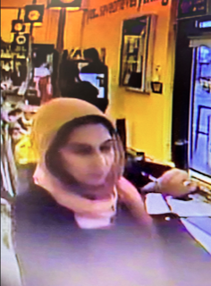 Person wearing a hat and mask.