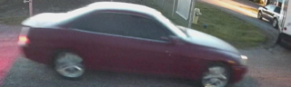 Red sports car, blurred motion