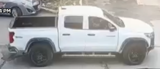 White pickup truck with roof rack