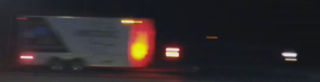 Truck with red and white lights.